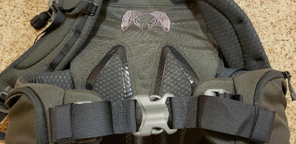 KUIU Venture 2300 back panel showing ergonomic lumbar support and padded shoulder straps